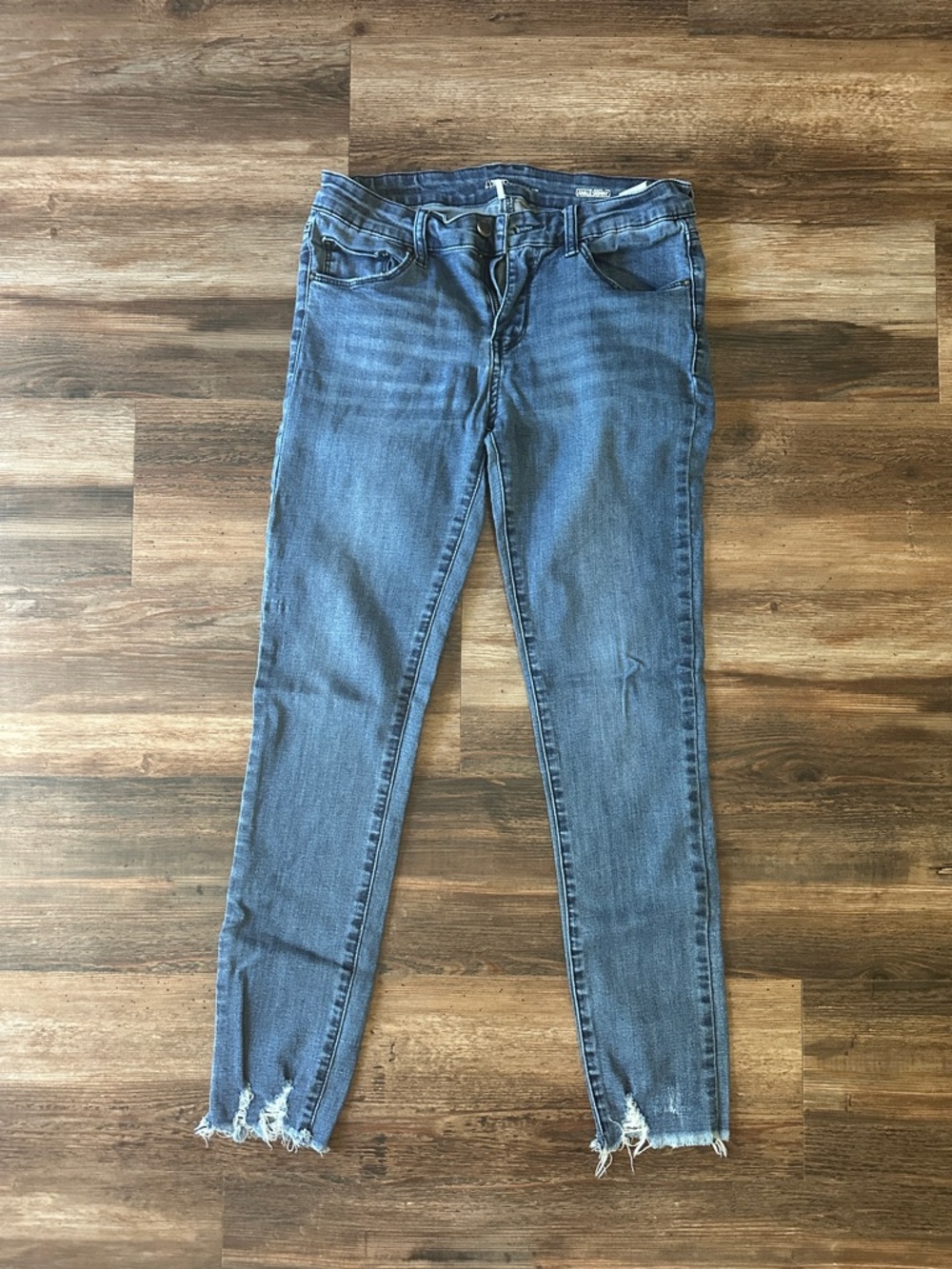 Classic Blue Skinny Jeans with Distressed Hem